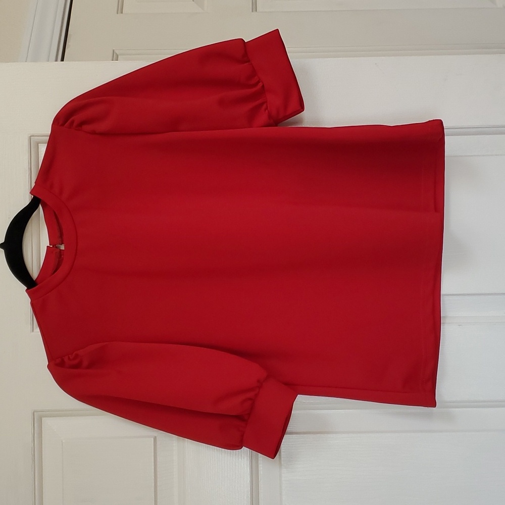 Blouse size medium.
